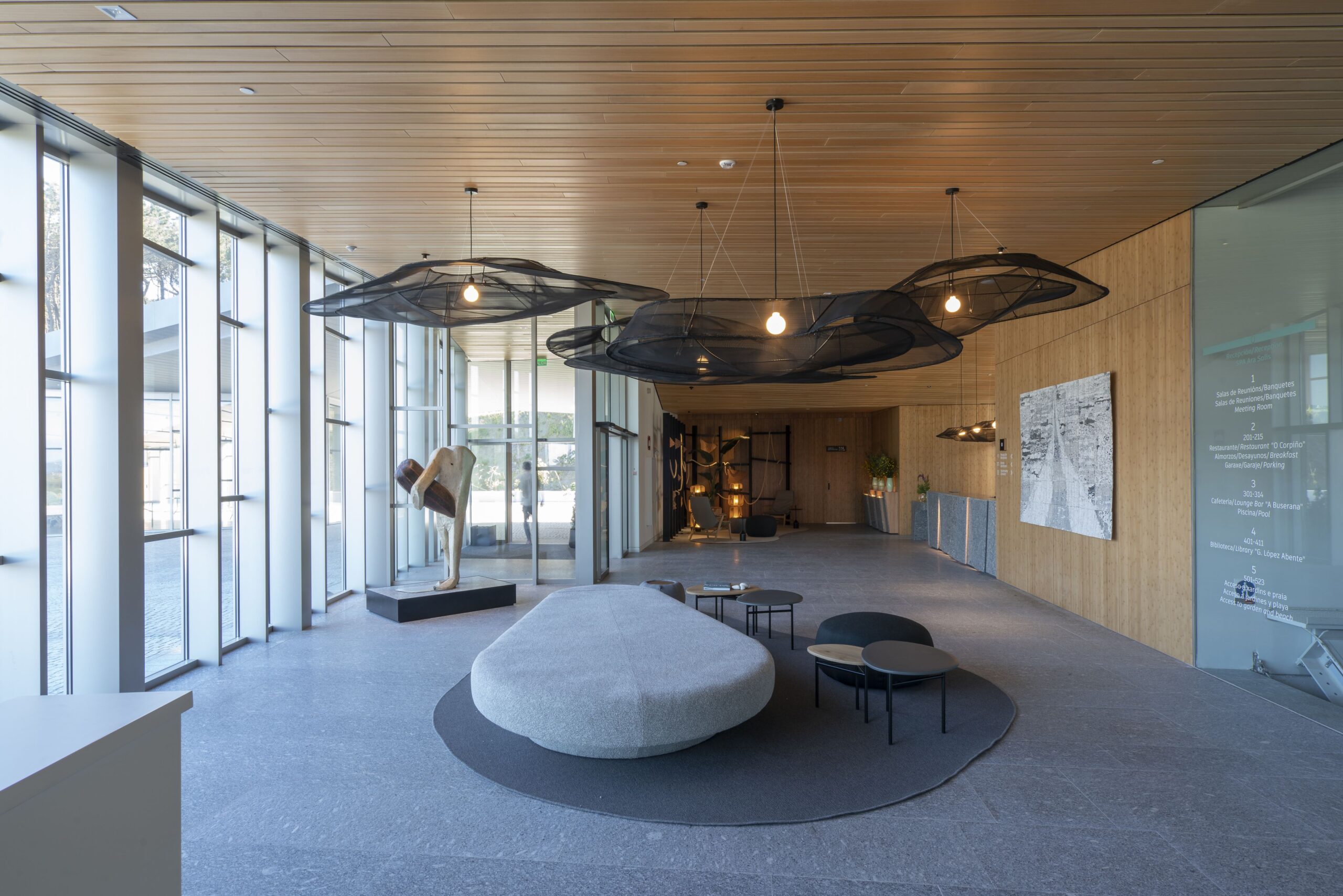 A lounge with a low sitting area in the middle
