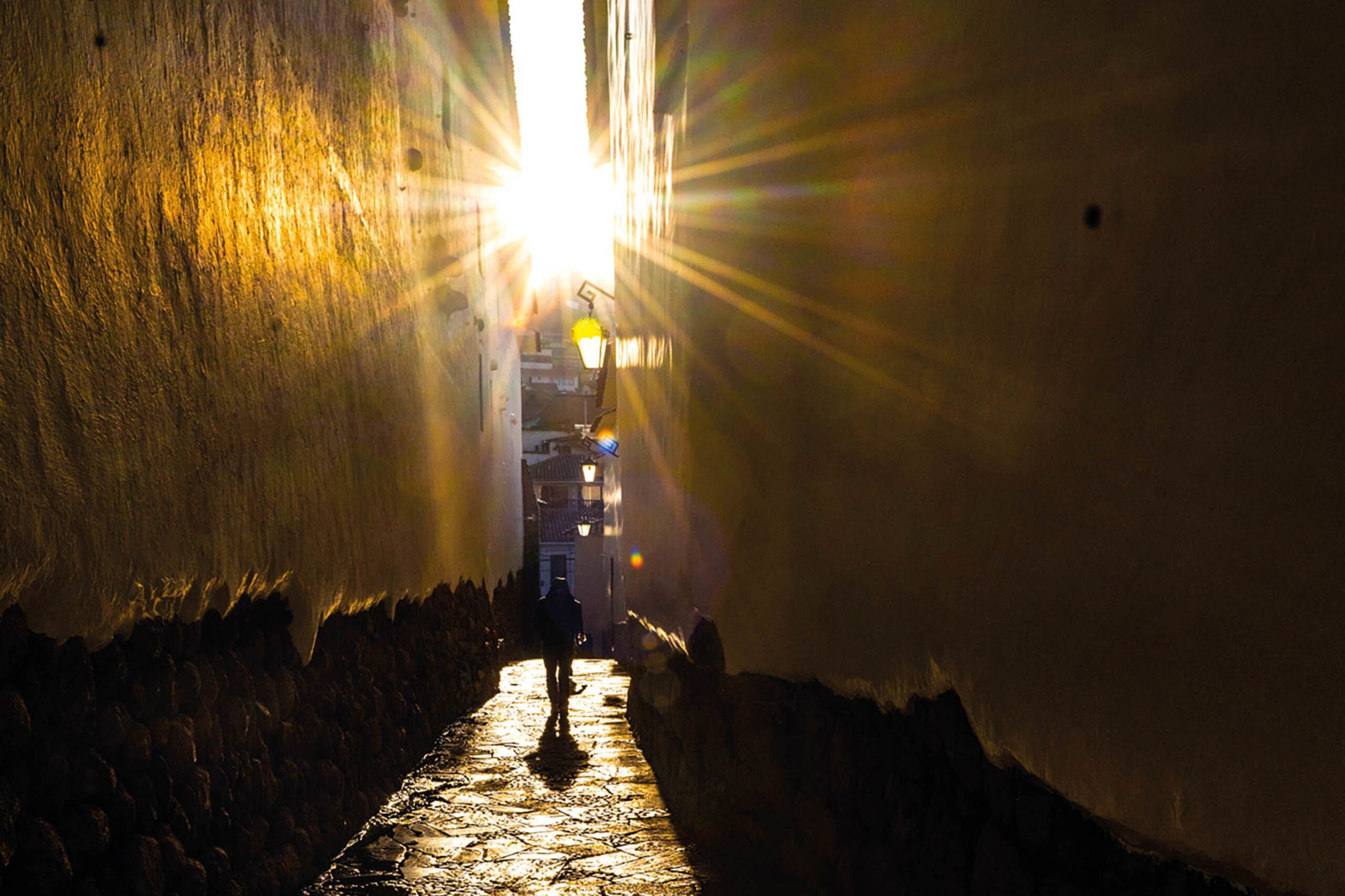 Sun beaming between two narrow walls
