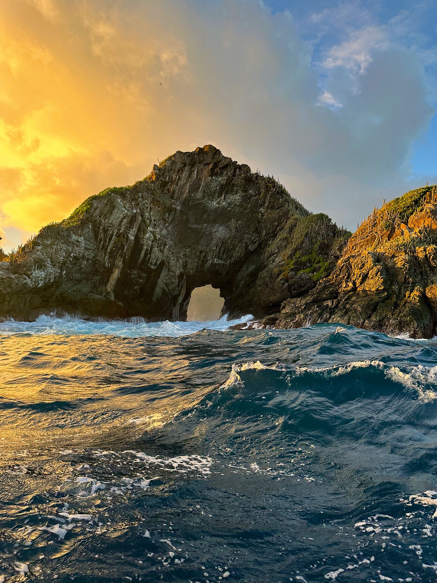 A stone arch in the ocean