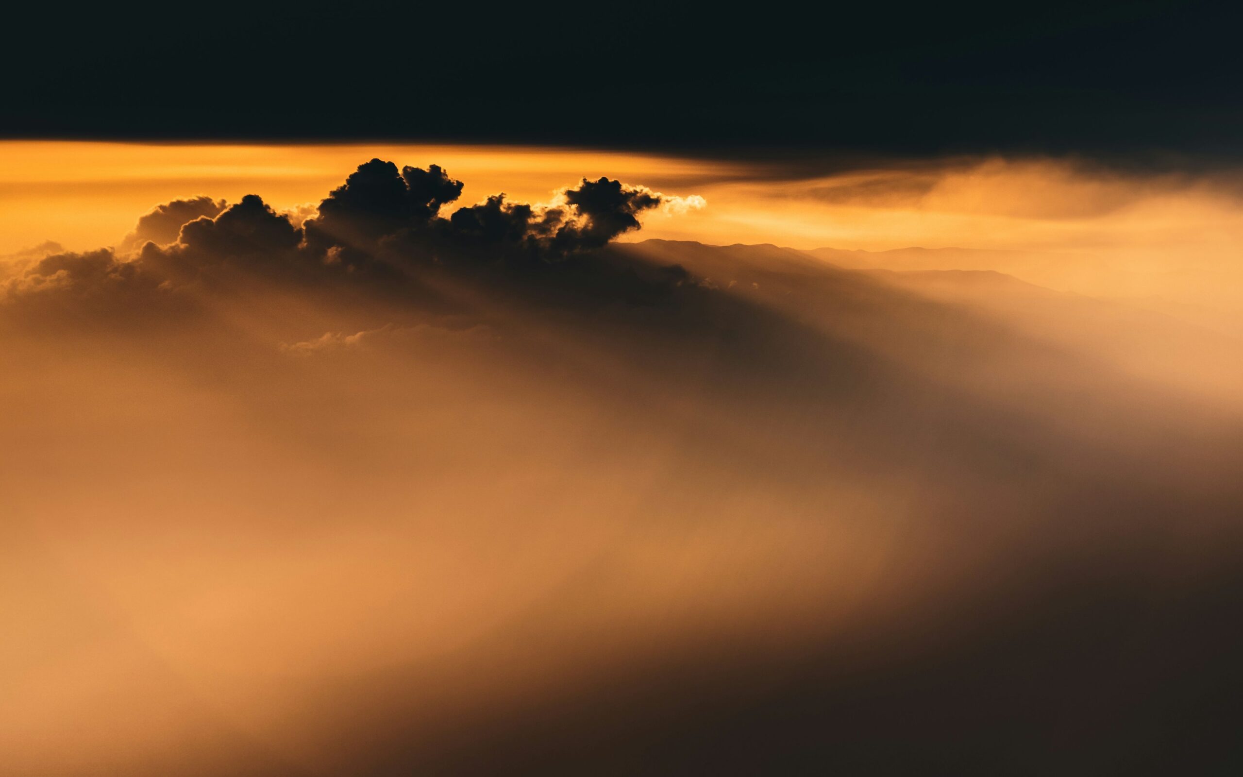 Sunset above the clouds