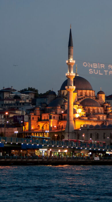 Mahya hanging between minarets on the New Mosque in Istanbul