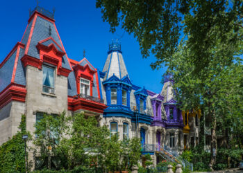 Montreal, Qc, Canada - July 26th 2020: Victorian architecture and colorful house facade of Square St Louis in Montreal Plateau Mont Royal neighborhood on a summer day