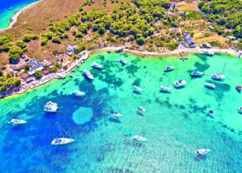 2EDT2M1 Hvar archipelago sailing turquoise beach aerial view. Island of Marinkovac on Paklenski Otoci islands. Dalmatia region of Croatia