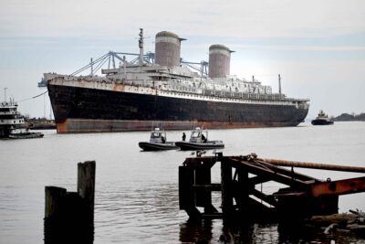 The SS United States, approaching her temporary home in Mobile, Alabama