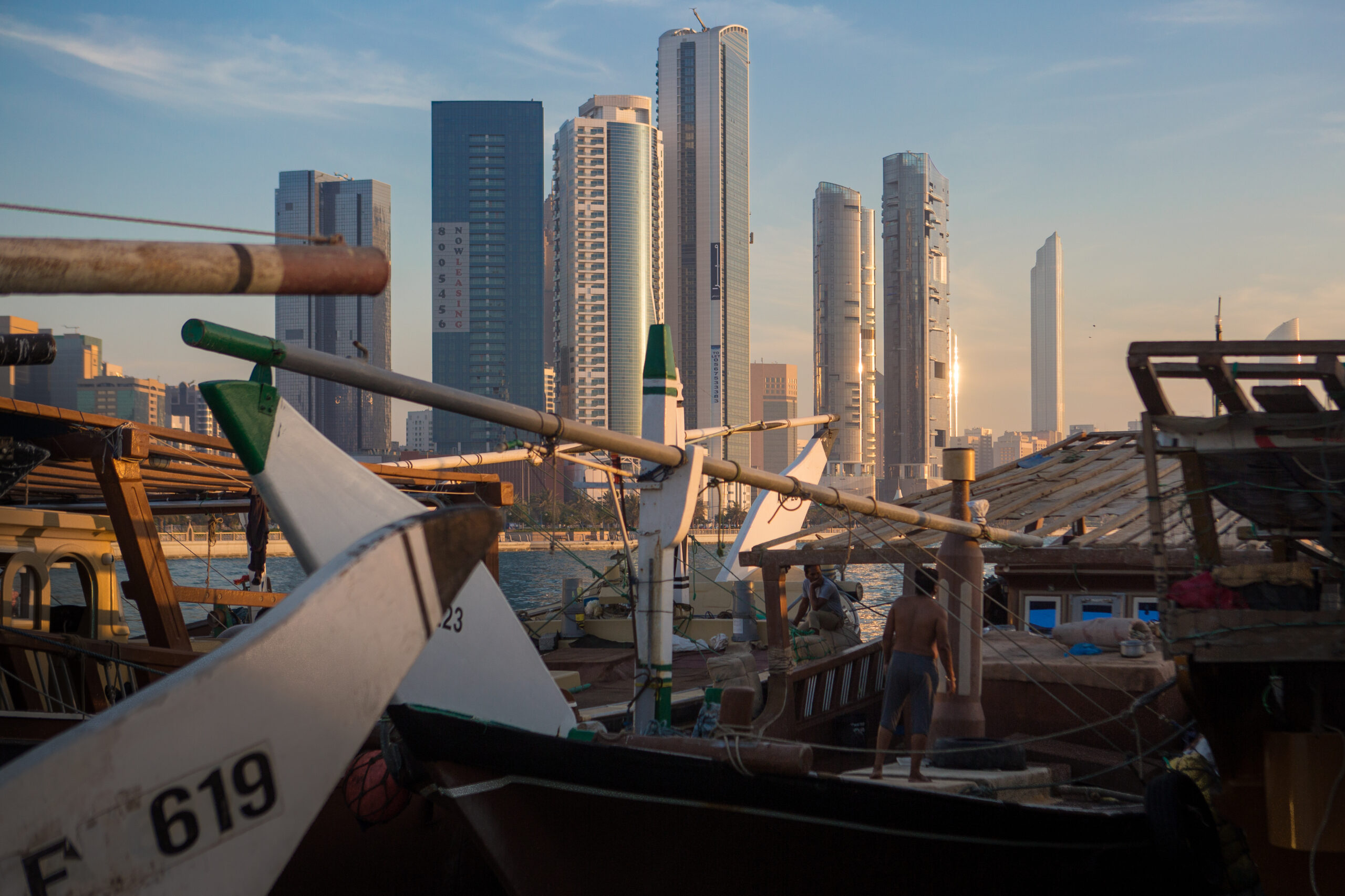 Abu Dhabi, UAE - October 10, 2018: View of the modern skyline of Abu Dhabi, seen from the Mina Zayed.