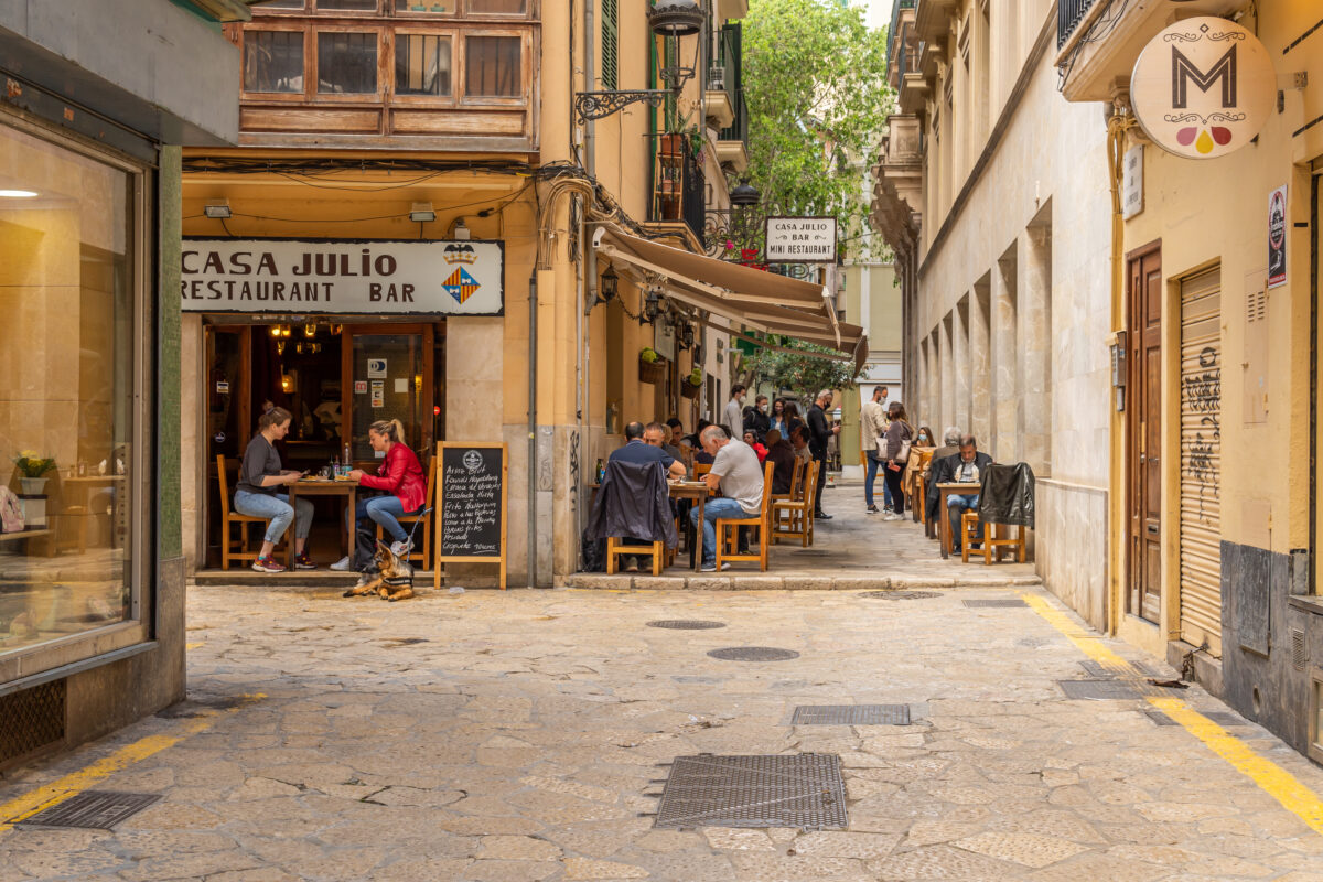 Shops and cafes in street, Palma, Mallorca